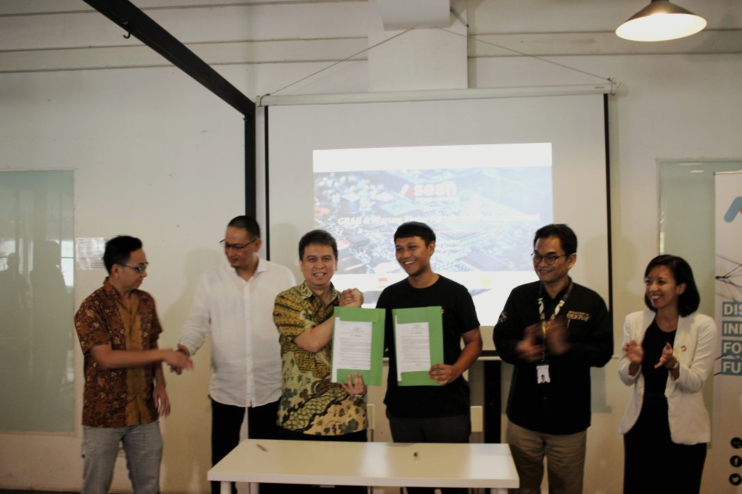 Kerjasama Grab dan Warung Pintar