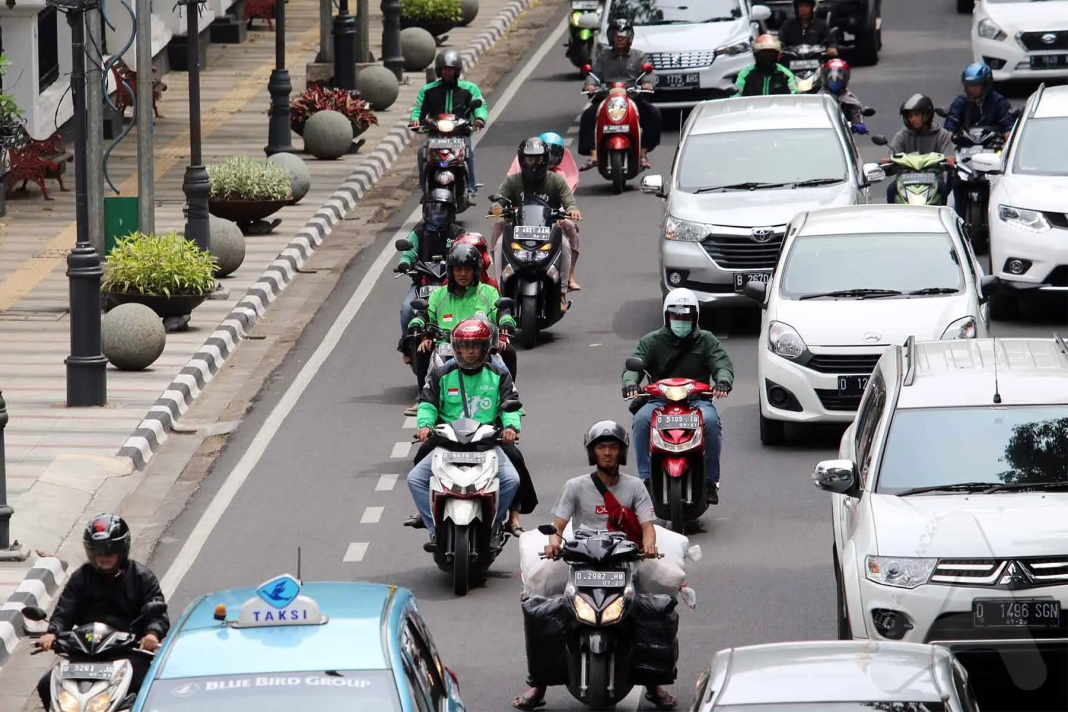 Ilustrasi tarif ojol naik.