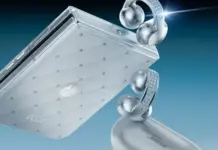 Motorola Razr foldable phone and Bose earbuds shown in a luxury Swarovski-styled edition with a silver, crystal-studded design