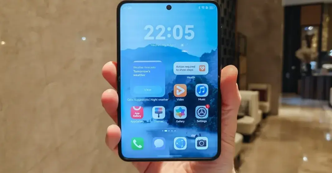 Huawei Pura X held in hand showcasing its foldable design and sleek form factor.