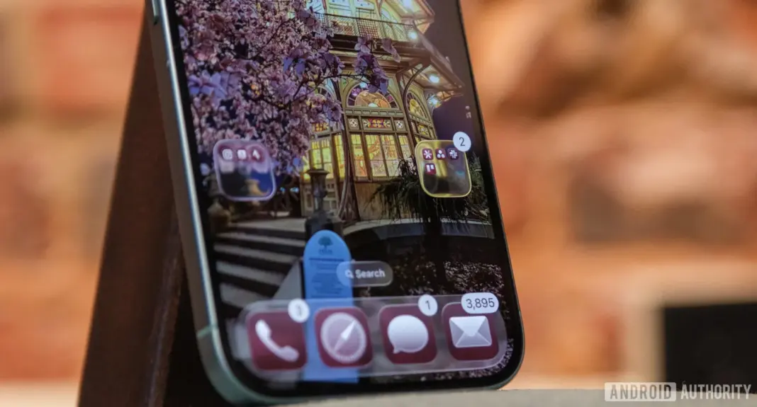 iOS 26 liquid glass folders pada layar iPhone
