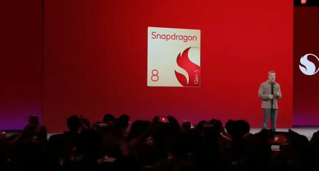 Ilustrasi logo Snapdragon 8 Gen 5 Qualcomm pada latar belakang gelap