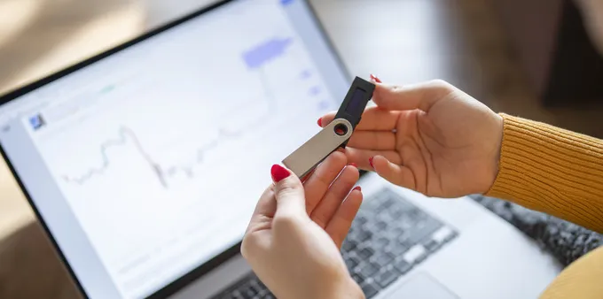 Woman holding a usb flash drive