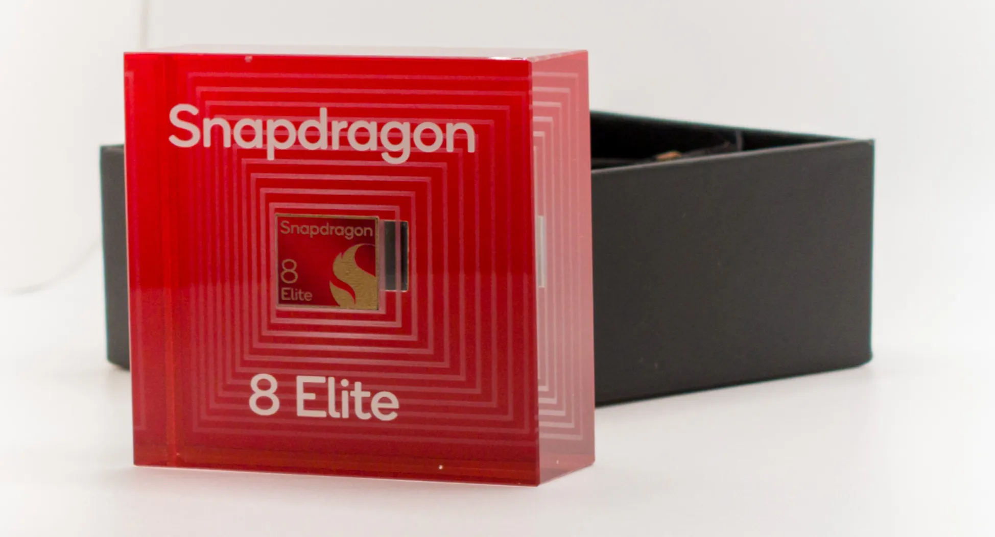 A Qualcomm Snapdragon 8 Elite placard at a press event