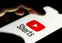 Ilustrasi YouTube Shorts dengan tampilan antarmuka mobile dan ikon monetisasi