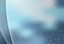 OnePlus 15 smartphone dengan layar menyala menunjukkan interface modern, ditempatkan di atas permukaan kayu gelap