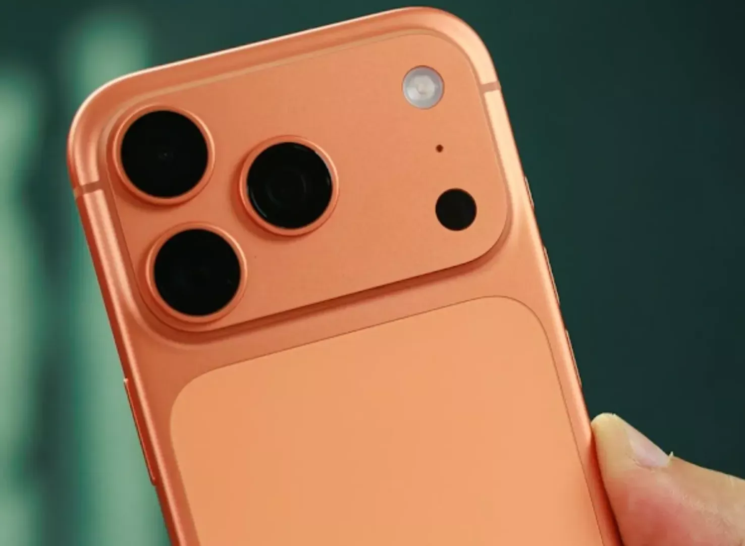 Rear camera island on Cosmic Orange iPhone 17 Pro Max