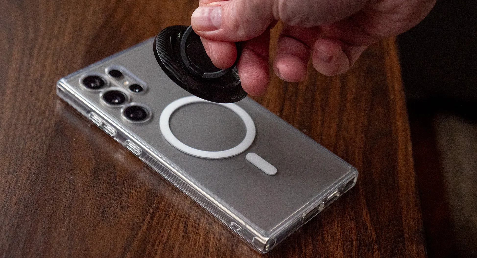 The Galaxy S24 Ultra with a case and MagSafe ring