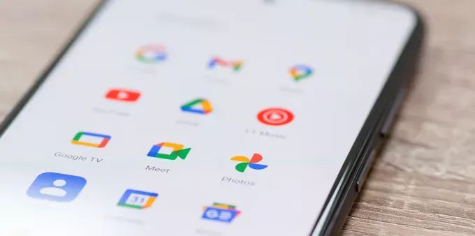 An Android phone displays several Google apps