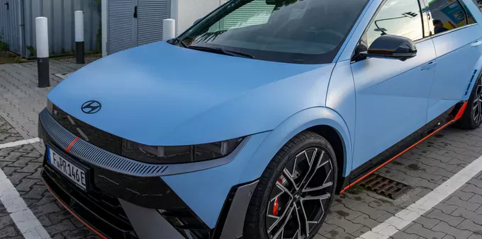 A light-blue 2024 Hyundai Ioniq 5 in a backlot.